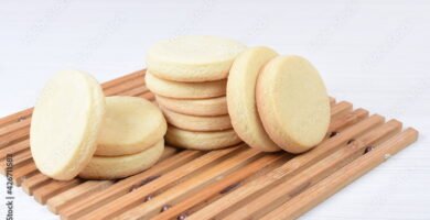 Butter cookies, on white wooden background